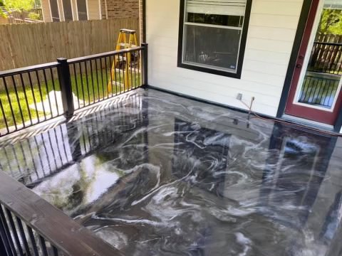 Custom deck outside a house with polished granite finished floor in Austin, TX